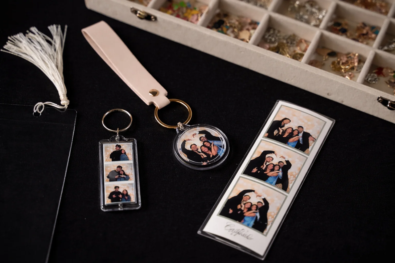 Close-up of custom photo keychains and bookmarks