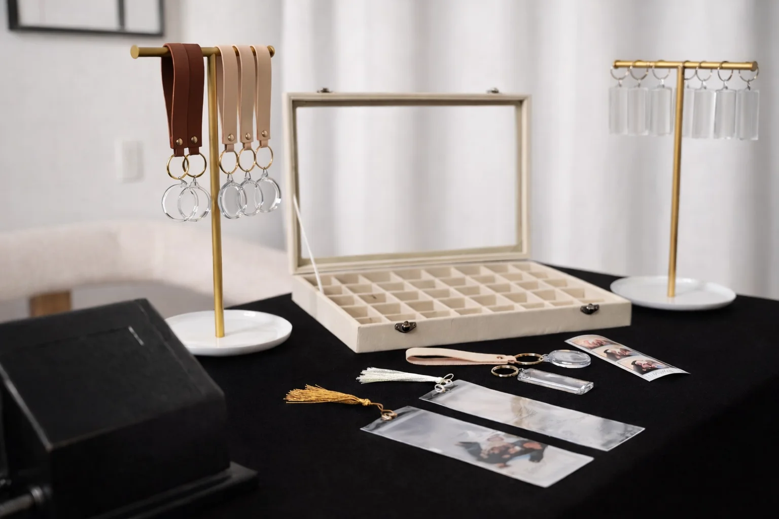 Keychain station setup with leather straps and display stands